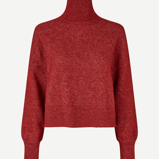 Long-sleeve knit turtleneck sweater in a heathered burgundy red, shown against a plain light gray background.