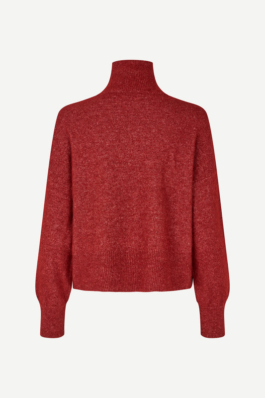 A heathered burgundy knit turtleneck sweater with long sleeves, shown from the back against a light gray background.