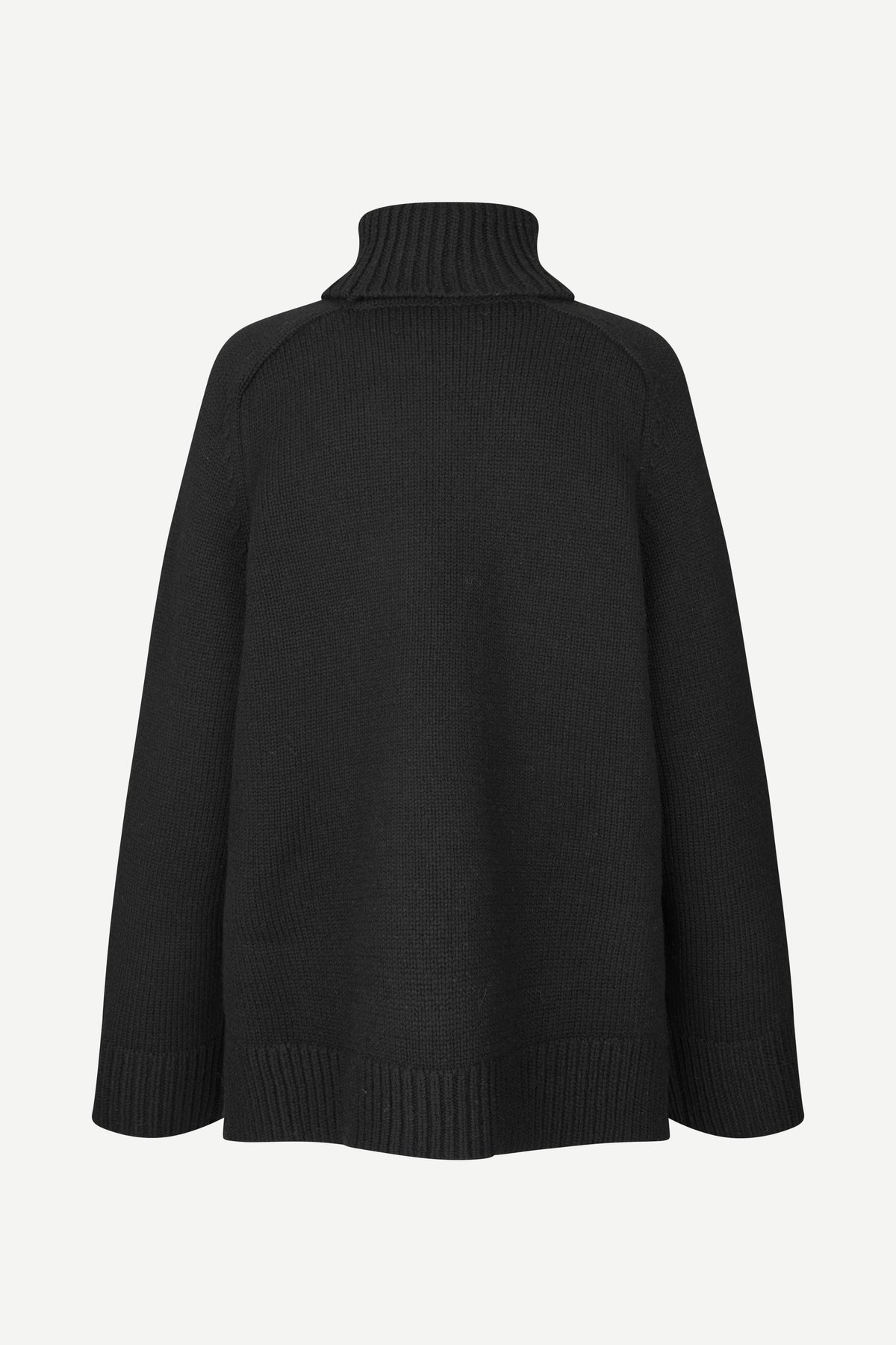 A black knit turtleneck sweater shown from the back, featuring a ribbed high collar, shoulders, cuffs, and hem, set against a plain light gray background.