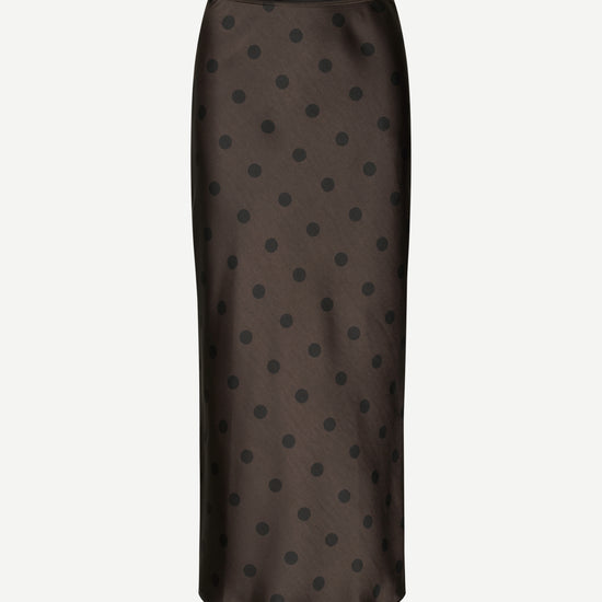 Black polka dot skirt on a white background