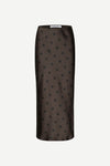 Black polka dot skirt on a white background
