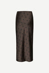Dark brown skirt with black polka dots on a white background
