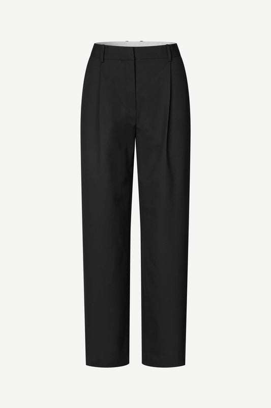 Black wide-leg cropped trousers with front pleats, shown on a light gray background.