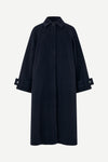 A dark navy blue wool-blend coat with a collar, front button closure, and buttoned cuffs, shown on a light gray background.