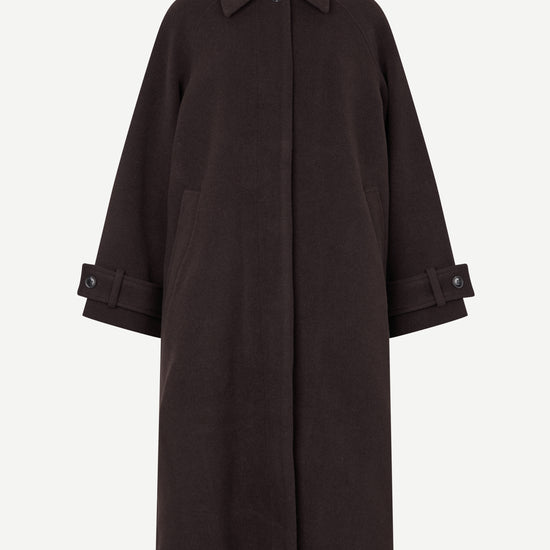 Dark brown coat on a white background