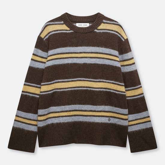 A long-sleeve crewneck knit sweater with horizontal stripes in dark brown, mustard yellow, and light gray, displayed flat against a light gray background.