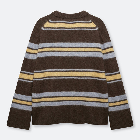 A brown knit sweater with horizontal stripes in yellow, light gray, and white, shown from the back against a light gray background.