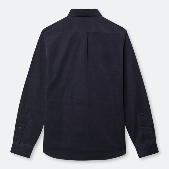 A dark navy blue long-sleeve button-up shirt shown from the back, featuring a subtle vertical pleat down the center back and buttoned cuffs, displayed on a light gray background.