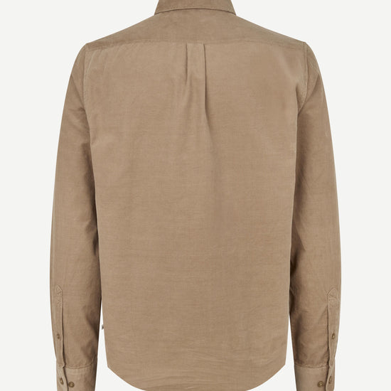 A tan long-sleeve button-up shirt shown from the back, featuring a subtle vertical pleat down the center back and button cuffs, set against a plain light gray background.