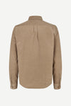 A tan long-sleeve button-up shirt shown from the back, featuring a subtle vertical pleat down the center back and button cuffs, set against a plain light gray background.
