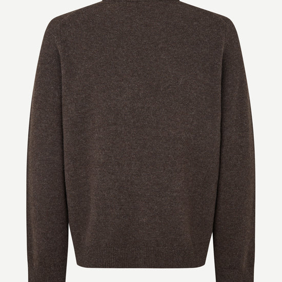 A dark brown knit sweater shown from the back, displayed on a clean, light off-white background.
