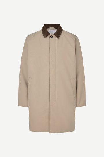 A beige trench coat with a contrasting dark brown corduroy collar, shown against a plain light gray background.