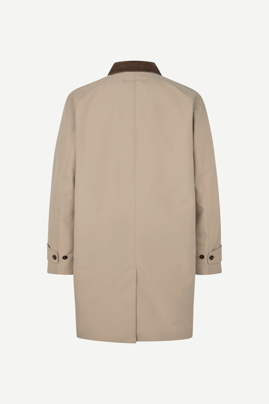 A beige trench coat shown from the back, featuring a dark brown collar and button details on the cuffs, set against a plain light gray background.