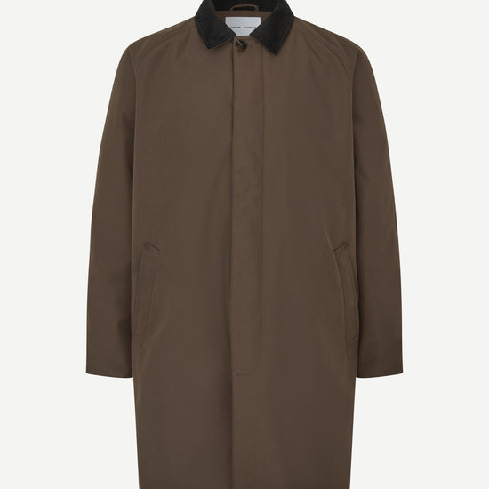 A brown longline utility coat with a contrasting black collar, displayed on a clean white background.