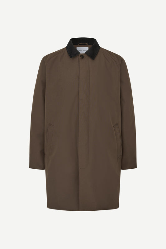 A brown longline utility coat with a contrasting black collar, displayed on a clean white background.