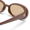 Brown sunglasses with a visible brand logo on a white background