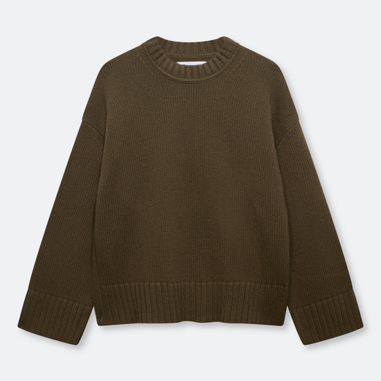 An oversized ribbed knit crewneck sweater in a dark brown color, displayed flat against a light gray background.