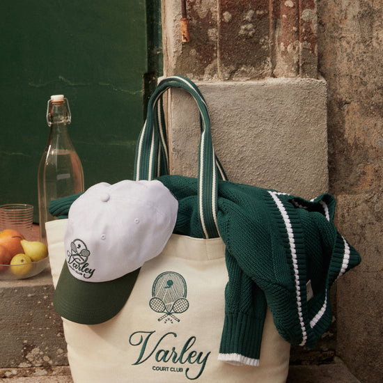 Green holdall woth hat and jumper