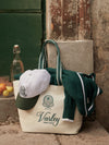 Green holdall woth hat and jumper