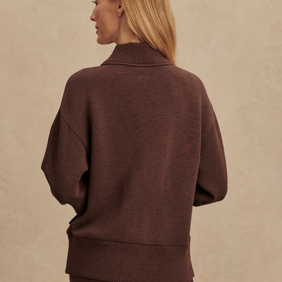 chocolate brown half zip jumper with dropped shoulder, rib detailing and gold zip rear view