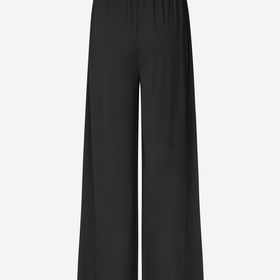 Black wide-leg pants on a white background