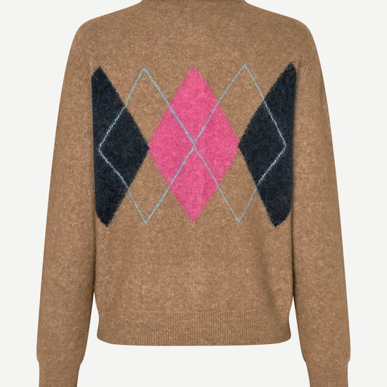 A brown knit sweater with a large argyle pattern on the back, featuring pink, black, and light blue diamonds, shown against a plain light background.