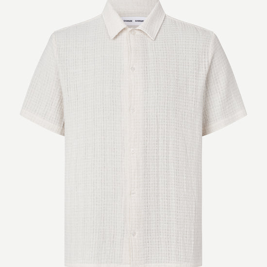 White checkered short-sleeve shirt on a white background