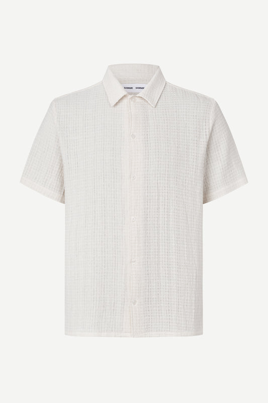 White checkered short-sleeve shirt on a white background