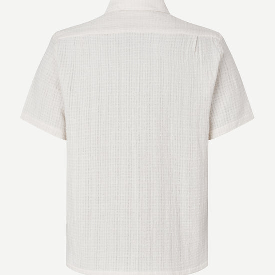 White short-sleeve shirt with a collar on a white background