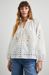 White Broderie anglais and embroidery top with notch neckline and tie with long sleeves and elasticated cuffs