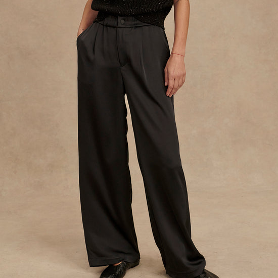 wide leg black viscose trousers with pleated front and side pockets
