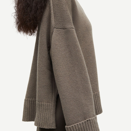 khaki green chunky roll neck jumper with ribbed neck, cuffs and hemline from samsoe samsoe side view