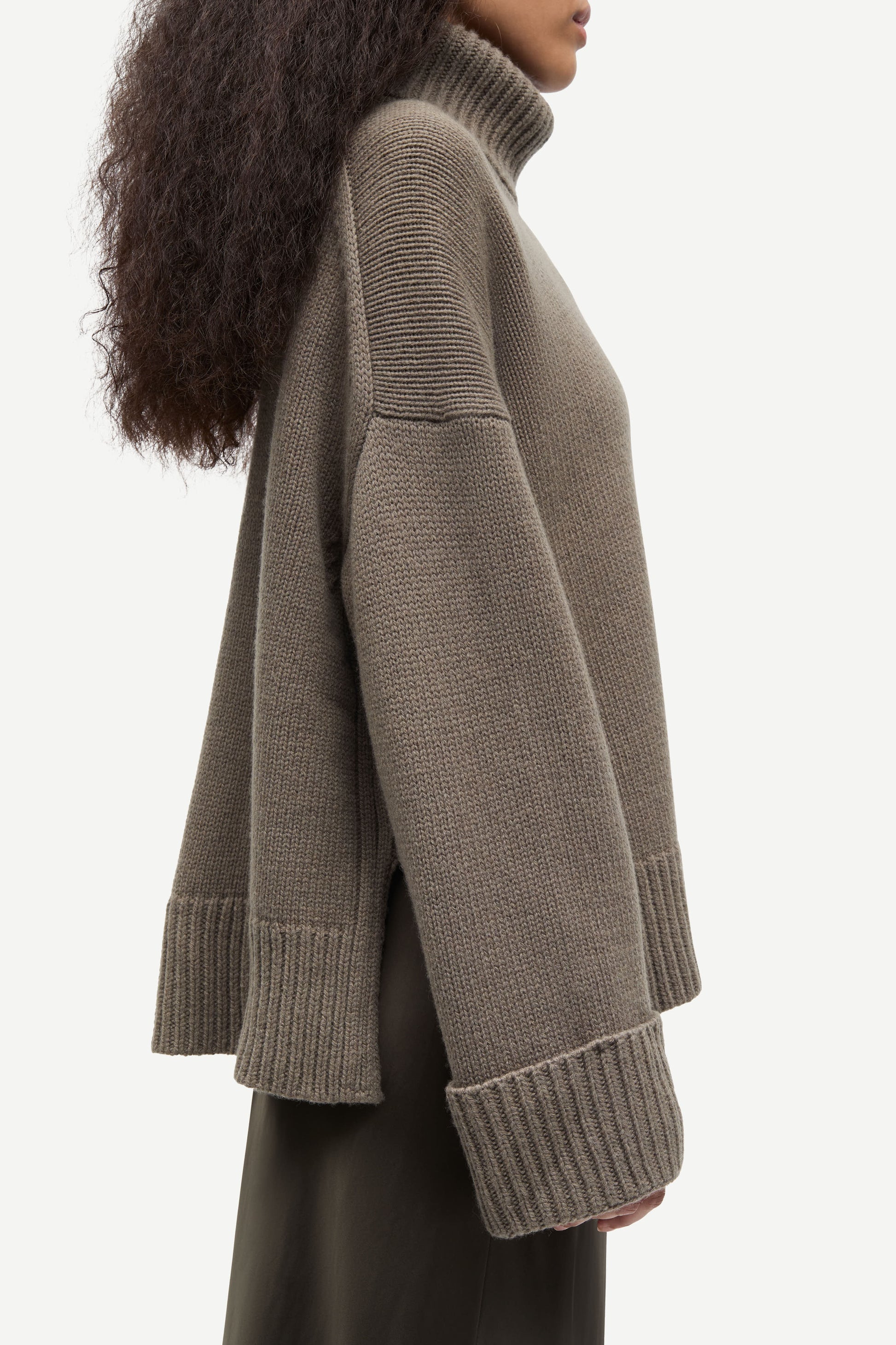 khaki green chunky roll neck jumper with ribbed neck, cuffs and hemline from samsoe samsoe side view