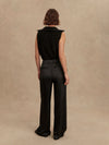 wide leg black viscose trousers with pleated front and side pockets rear view