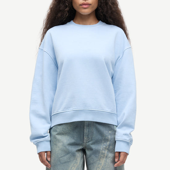 light blue round neck cotton jumper with rib detailing model shot