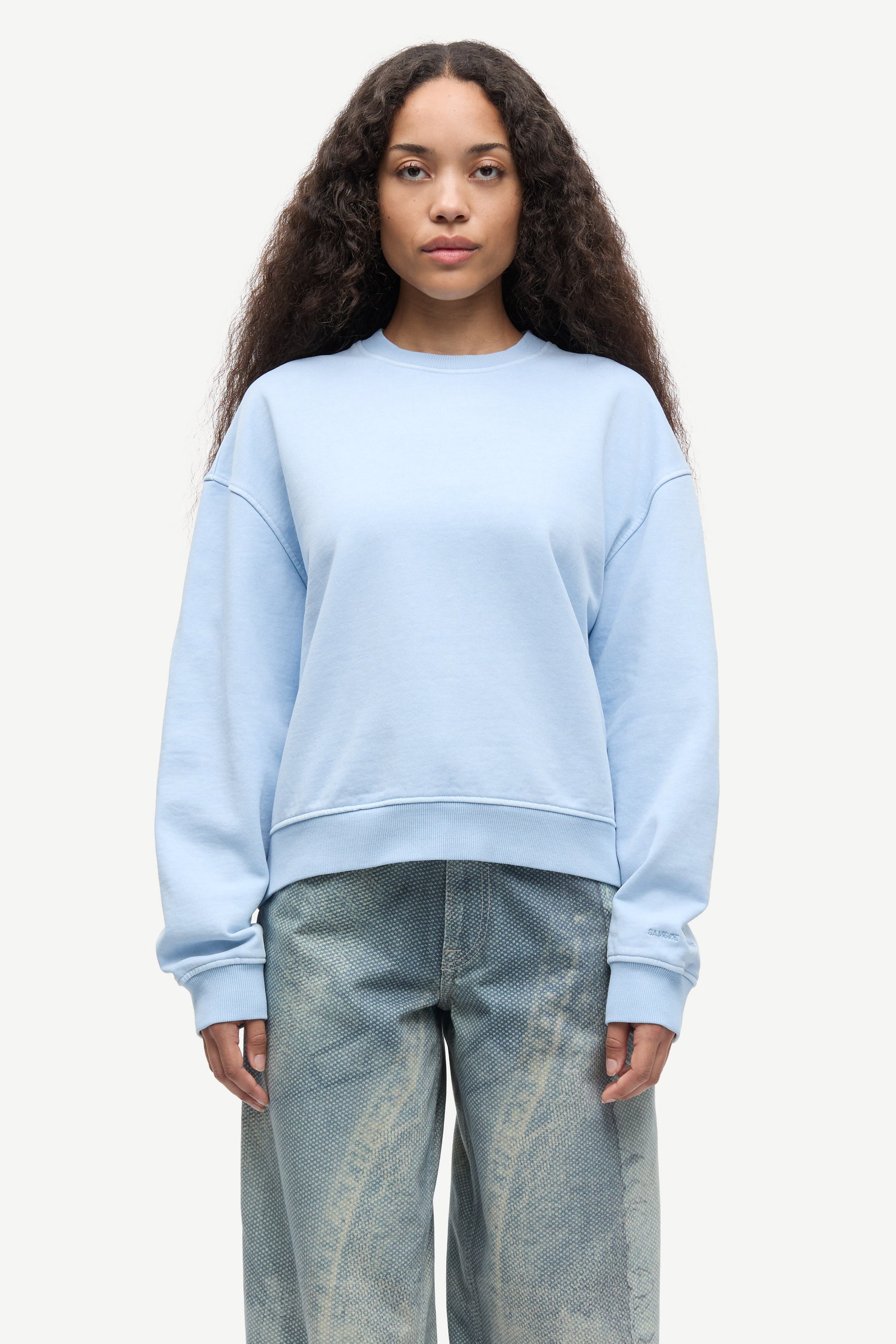 light blue round neck cotton jumper with rib detailing model shot