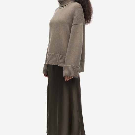khaki green chunky roll neck jumper with ribbed neck, cuffs and hemline from samsoe samsoe side view