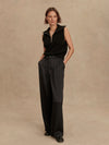wide leg black viscose trousers with pleated front and side pockets model shot