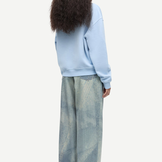 light blue round neck cotton jumper with rib detailing rear view