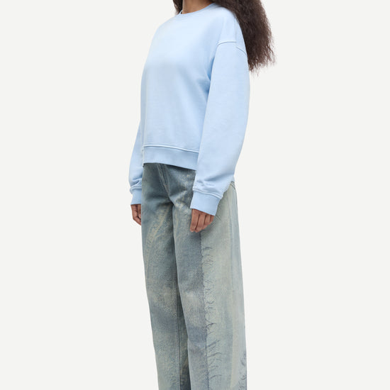 light blue round neck cotton jumper with rib detailing model shot