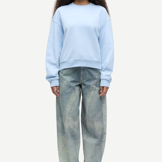 light blue round neck cotton jumper with rib detailing model shot