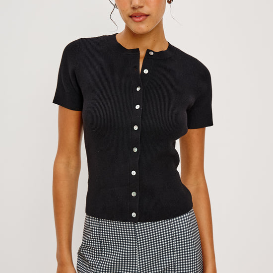 short sleeve round neck button down black top from rails model shot