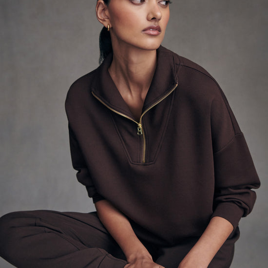 brown half zip high neck jumper with zip detailing model shot