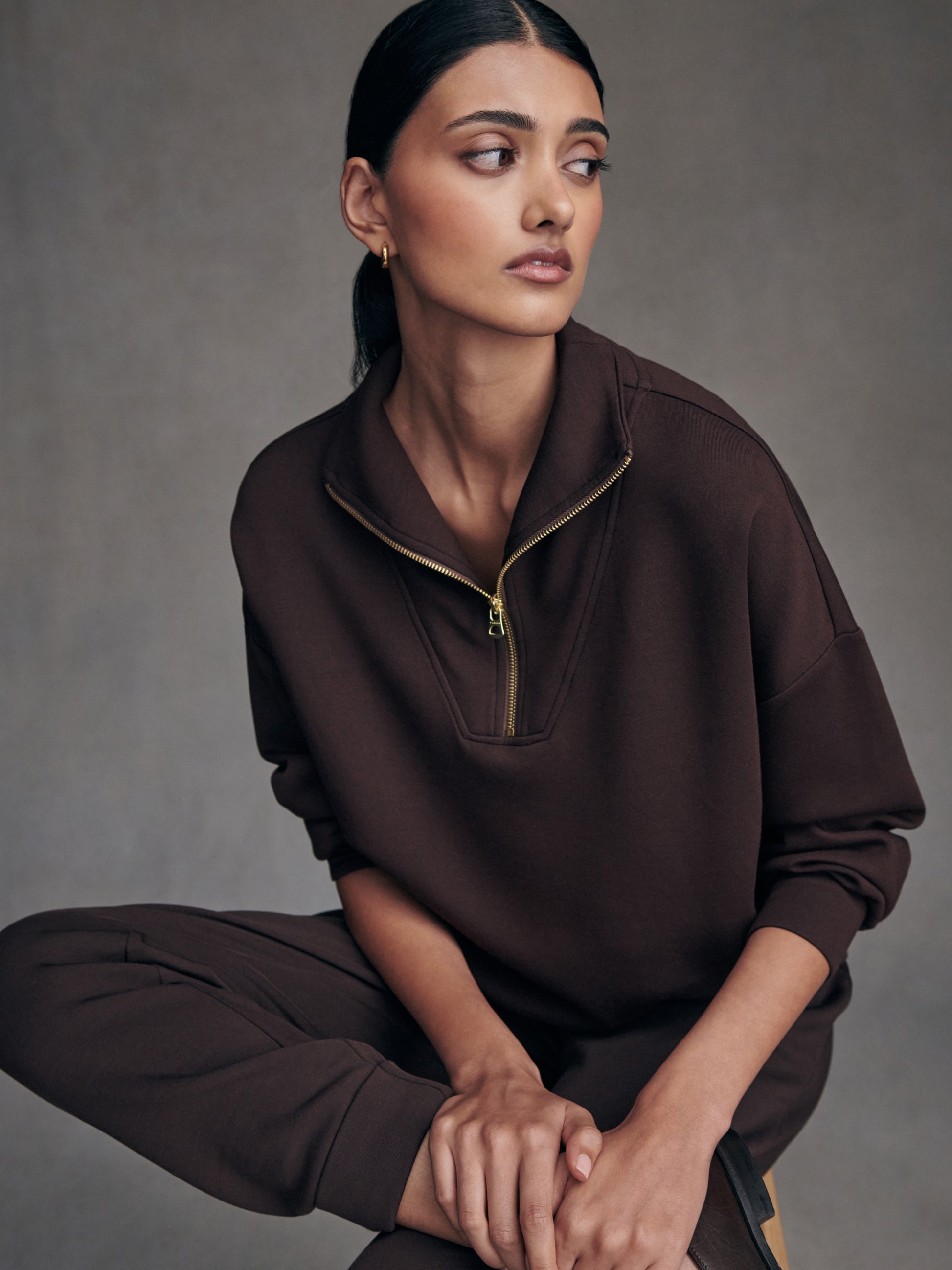brown half zip high neck jumper with zip detailing model shot