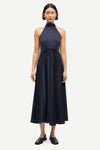 navy blue halterneck dress with open back and tie detail from samsoe samsoe model shot