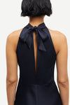 navy blue halterneck dress with open back and tie detail from samsoe samsoe rear view close up
