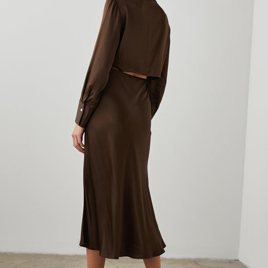 Open back shirt dress in dark chocolate satin fabric with slip skirt and side split