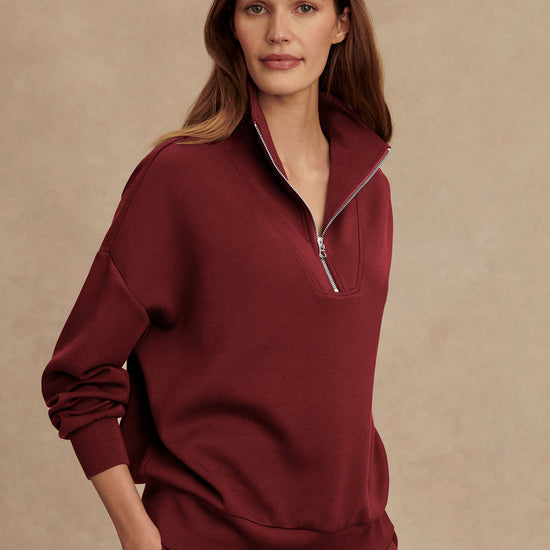 maroon high neck quarter zip jumper with zip detailing and relaxed fit side view 