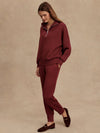 maroon high neck quarter zip jumper with zip detailing and relaxed fit model shot