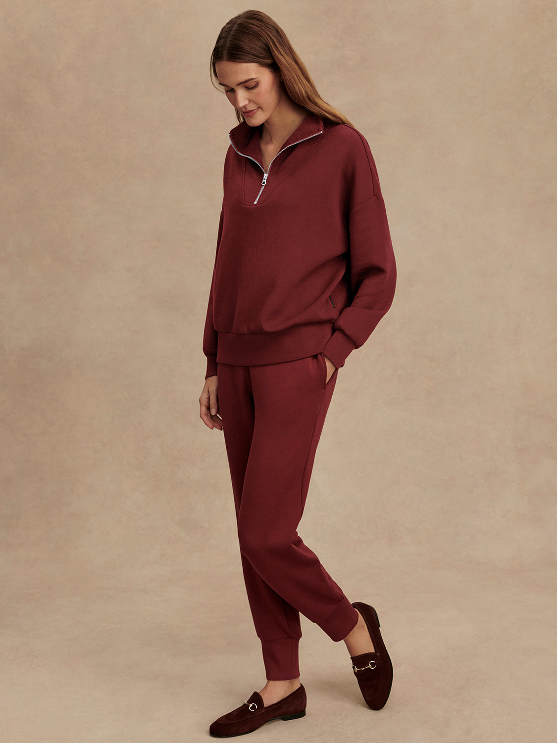 maroon high neck quarter zip jumper with zip detailing and relaxed fit model shot